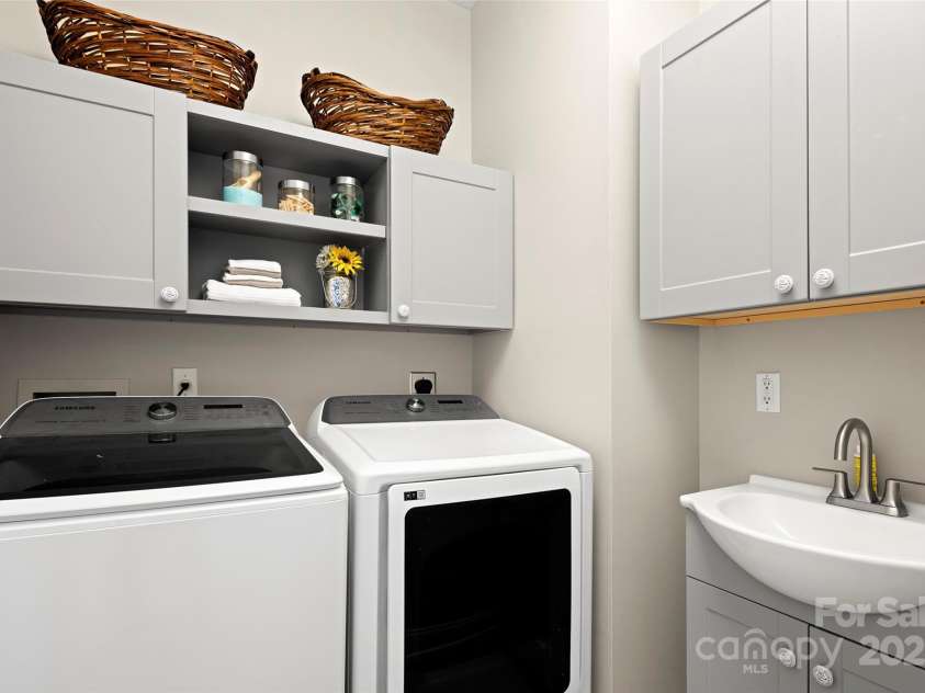 301 Governors Drive, Hendersonville, NC 28791.  MLS# CAR4251149, YatesRealty ID 10194. Laundry Room on Main Level