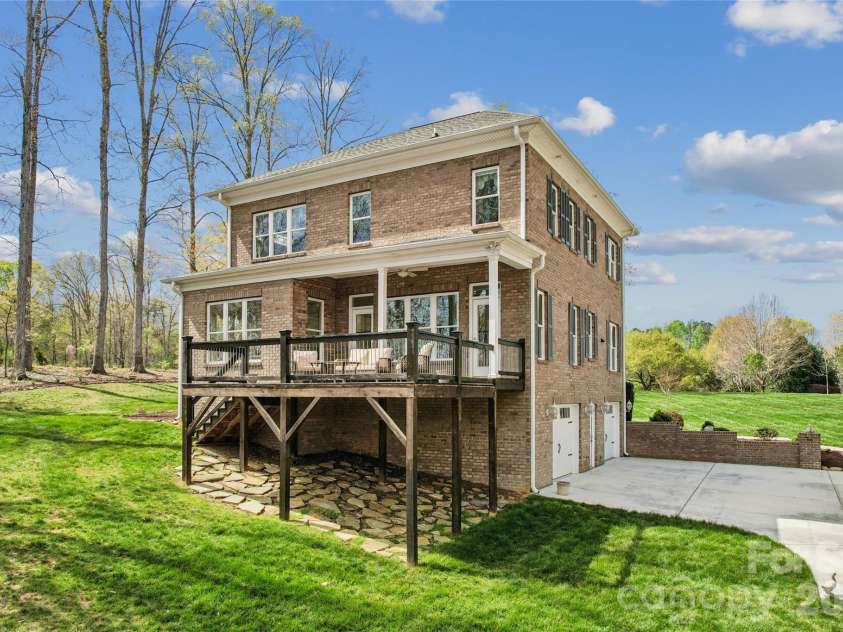 902 Bridgewater Drive, Monroe, NC 28112.  MLS# CAR4361236, YatesRealty ID 10198. Back Deck and Extended Driveway