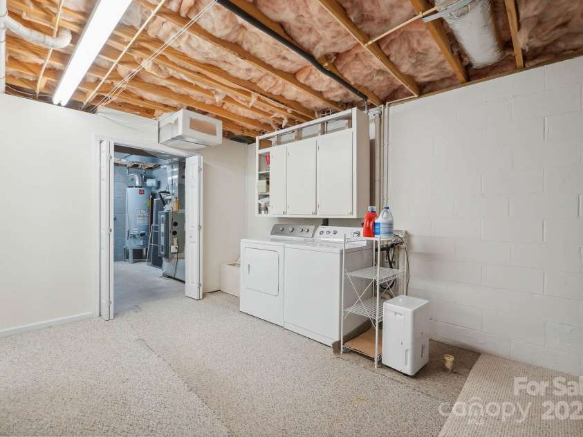 210 35th Avenue, Hickory, NC 28601.  MLS# CAR4245350, YatesRealty ID 10200. Laundry Room w/a LARGE storage closet.
