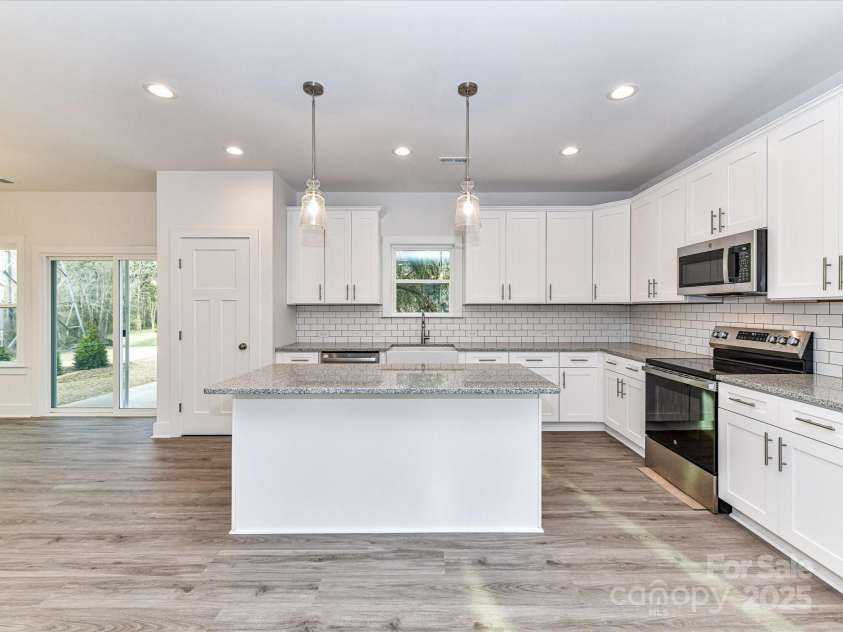 5613 Morgan Mill Road, Monroe, NC 28110.  MLS# CAR4277856, YatesRealty ID 10206. 