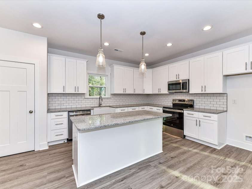 5613 Morgan Mill Road, Monroe, NC 28110.  MLS# CAR4277856, YatesRealty ID 10206. 