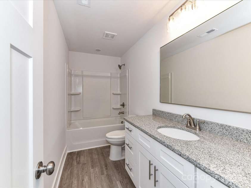 5613 Morgan Mill Road, Monroe, NC 28110.  MLS# CAR4277856, YatesRealty ID 10206. 