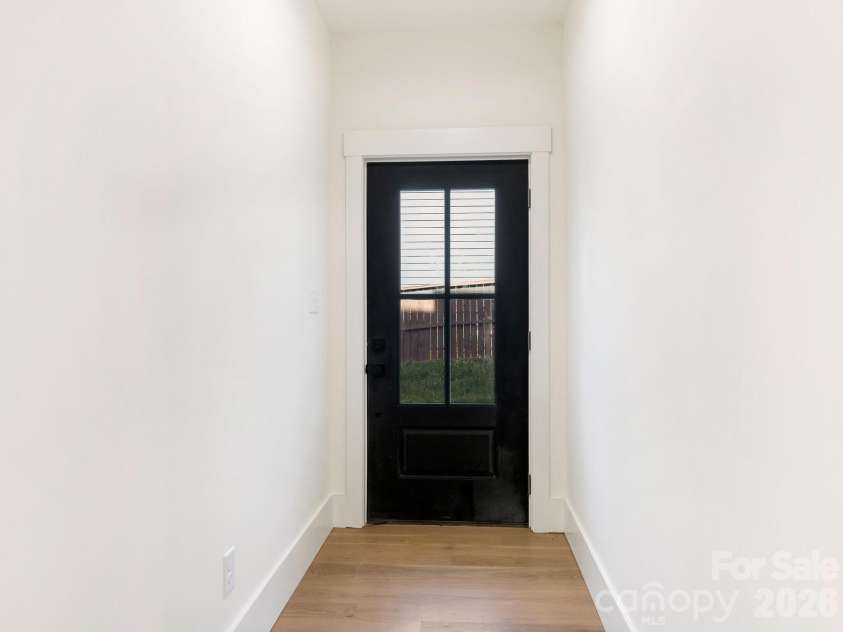 129 French Street, Charlotte, NC 28216.  MLS# CAR4356749, YatesRealty ID 10213. Side entry