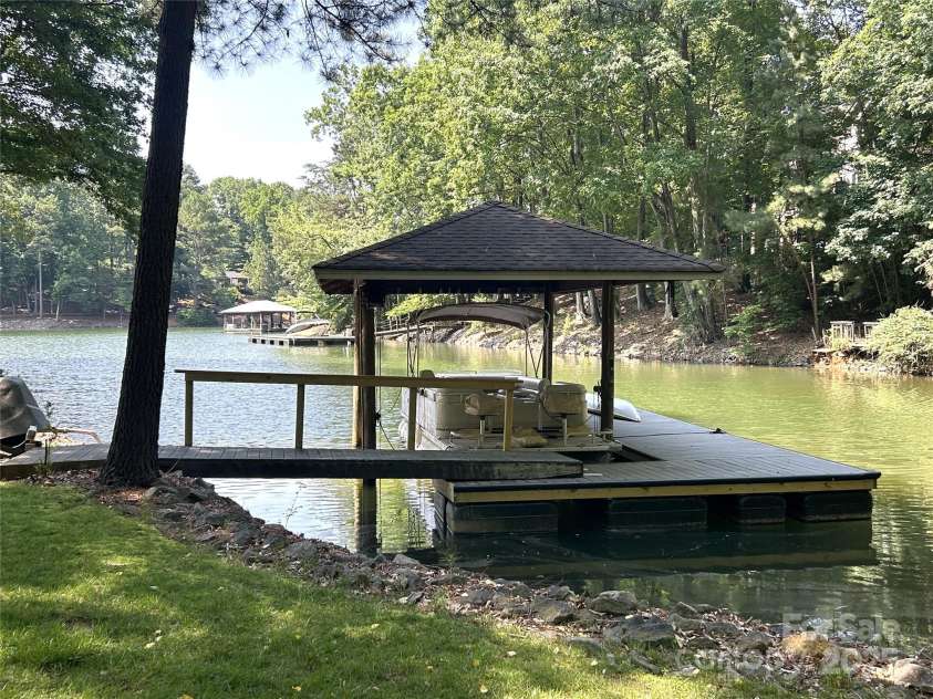 301 Agnew Road, Mooresville, NC 28117.  MLS# CAR4167254, YatesRealty ID 10216. Boatslip & Covered Dock