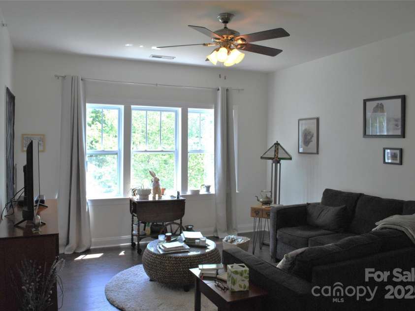 20 Foxden Drive, Fletcher, NC 28732.  MLS# CAR4266872, YatesRealty ID 10222. Living room--lots of natural light