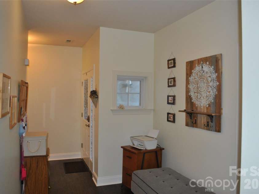 20 Foxden Drive, Fletcher, NC 28732.  MLS# CAR4337206, YatesRealty ID 10222. Foyer looking towards front door