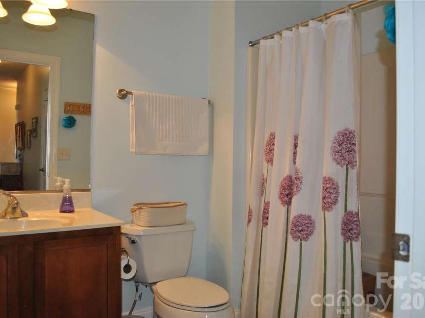 20 Foxden Drive, Fletcher, NC 28732.  MLS# CAR4337206, YatesRealty ID 10222. Guest bathroom