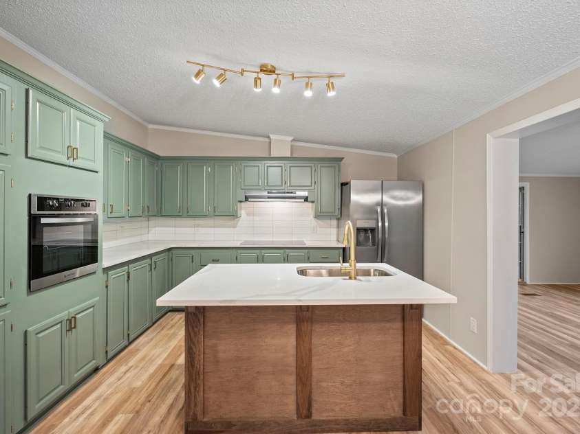 1005 Praley Street, Valdese, NC 28690.  MLS# CAR4245683, YatesRealty ID 10225. 