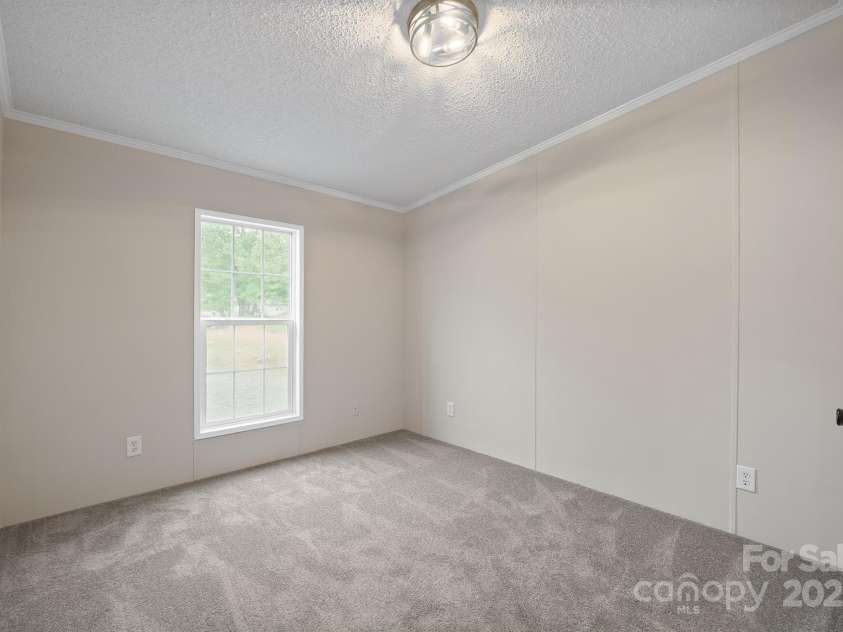 1005 Praley Street, Valdese, NC 28690.  MLS# CAR4245683, YatesRealty ID 10225. Bedroom 2