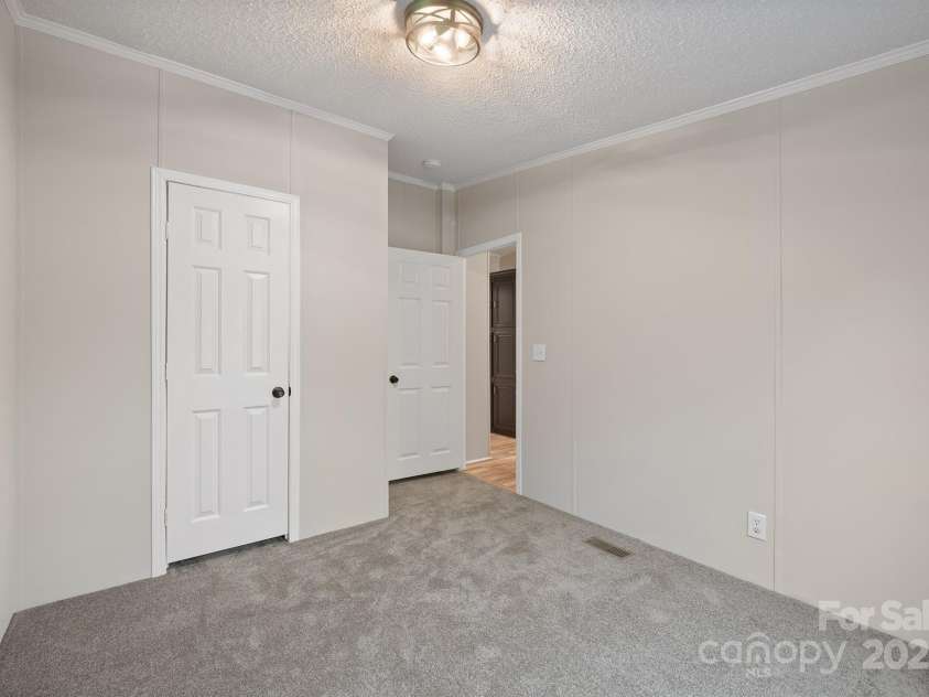 1005 Praley Street, Valdese, NC 28690.  MLS# CAR4245683, YatesRealty ID 10225. Bedroom 2