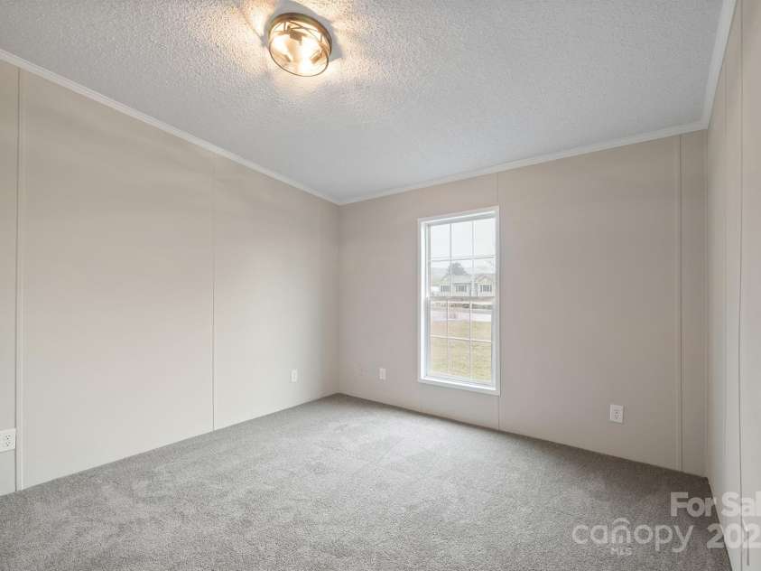 1005 Praley Street, Valdese, NC 28690.  MLS# CAR4245683, YatesRealty ID 10225. Bedroom 3