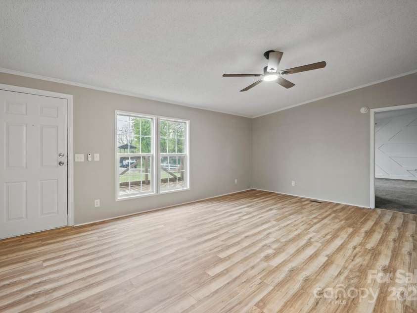 1005 Praley Street, Valdese, NC 28690.  MLS# CAR4245683, YatesRealty ID 10225. Living Room