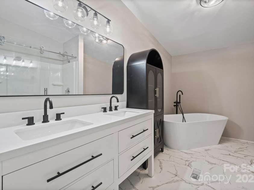 1005 Praley Street, Valdese, NC 28690.  MLS# CAR4245683, YatesRealty ID 10225. Primary Bathroom