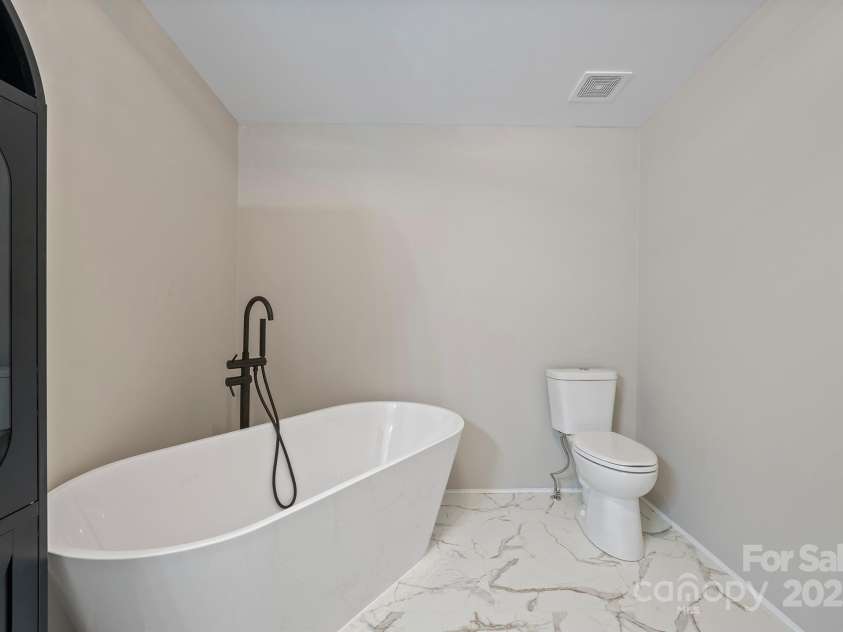 1005 Praley Street, Valdese, NC 28690.  MLS# CAR4245683, YatesRealty ID 10225. Primary Bathroom