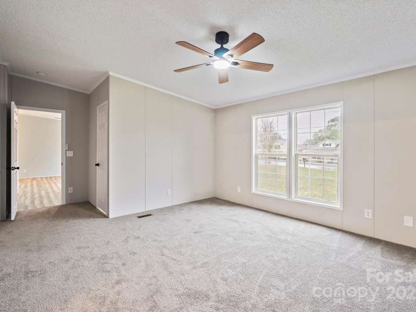 1005 Praley Street, Valdese, NC 28690.  MLS# CAR4245683, YatesRealty ID 10225. Primary Bedroom
