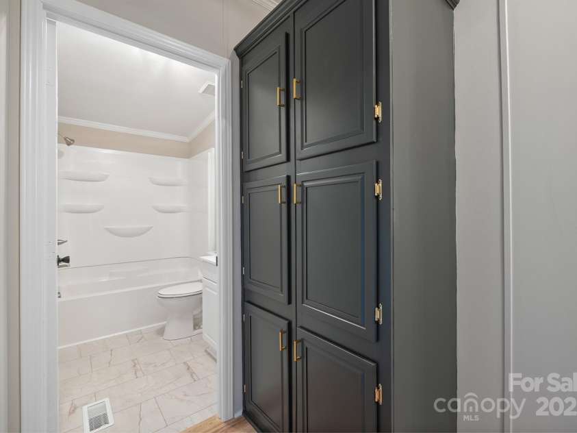 1005 Praley Street, Valdese, NC 28690.  MLS# CAR4245683, YatesRealty ID 10225. Storage Outside Hall Bath