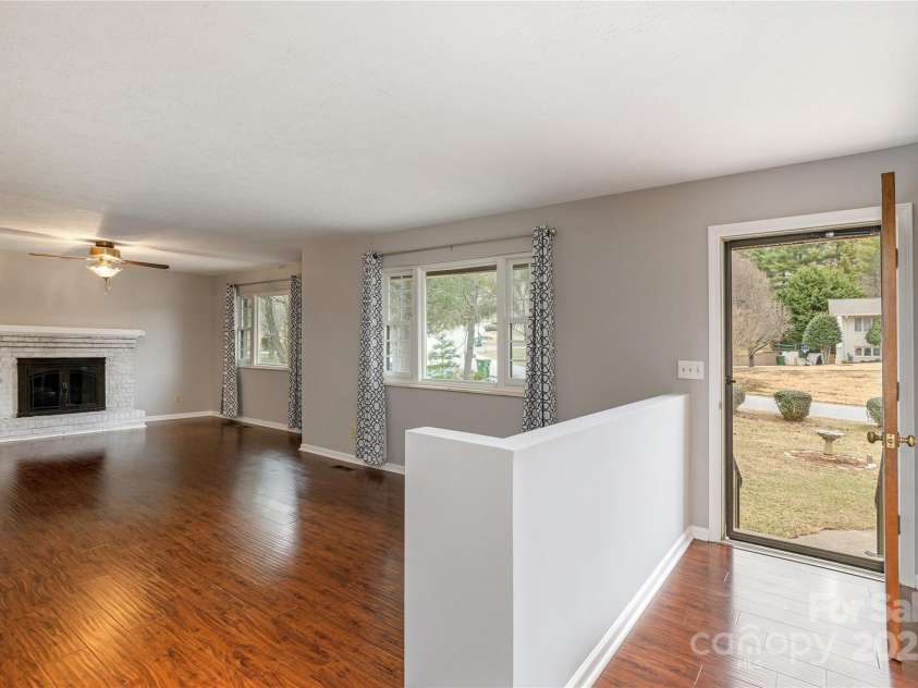89 Braddock Way, Asheville, NC 28803.  MLS# CAR4217900, YatesRealty ID 1023. Large living with fireplace