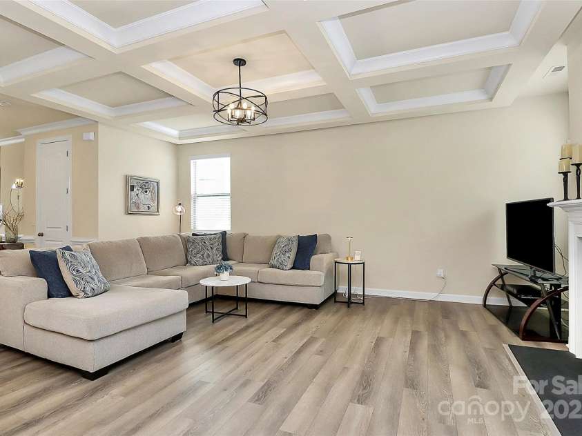 16019 Kelby Cove, Charlotte, NC 28278.  MLS# CAR4252849, YatesRealty ID 10231. Living room with coffered ceilings