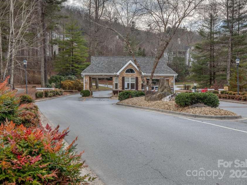 608 Carriage Commons Drive, Hendersonville, NC 28791.  MLS# CAR4215981, YatesRealty ID 10235. Guardhouse