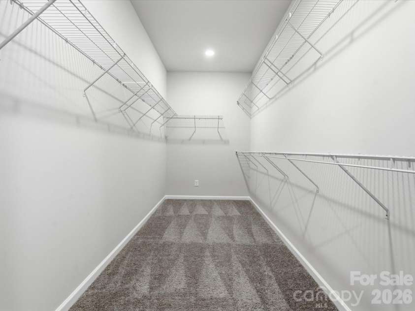8018 Houser Street, Cornelius, NC 28031.  MLS# CAR4321846, YatesRealty ID 10235. 1 of 2 walk-in primary closets!