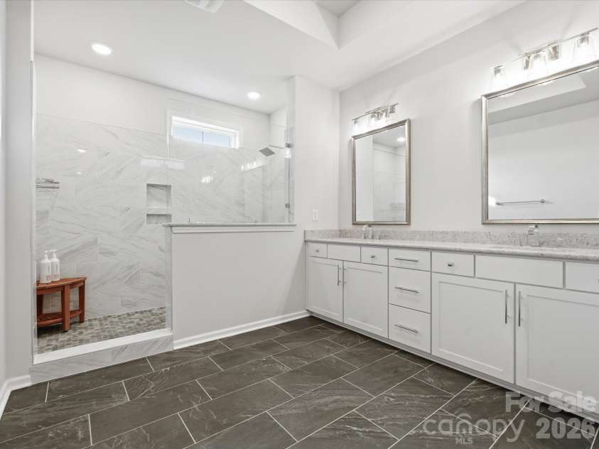 8018 Houser Street, Cornelius, NC 28031.  MLS# CAR4321846, YatesRealty ID 10235. Large primary bathroom