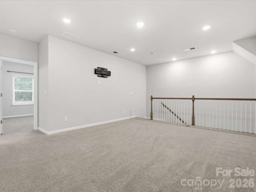 8018 Houser Street, Cornelius, NC 28031.  MLS# CAR4321846, YatesRealty ID 10235. Loft