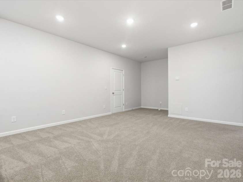 8018 Houser Street, Cornelius, NC 28031.  MLS# CAR4321846, YatesRealty ID 10235. Upstairs loft