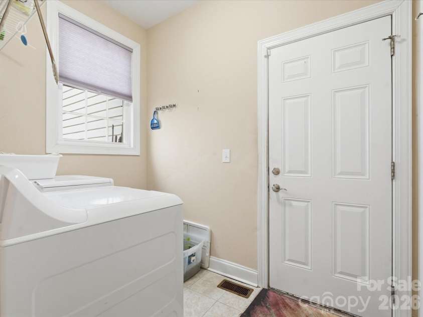 1249 Maddy Lane, Rock Hill, SC 29732.  MLS# CAR4340570, YatesRealty ID 10238. Laundry room with pantry