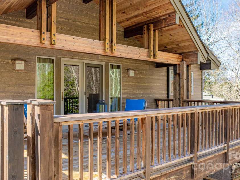 950 Black Forest Drive, Marion, NC 28752.  MLS# CAR4217616, YatesRealty ID 1025. Upper level private loft deck with patio doors with stunning craftmanship.