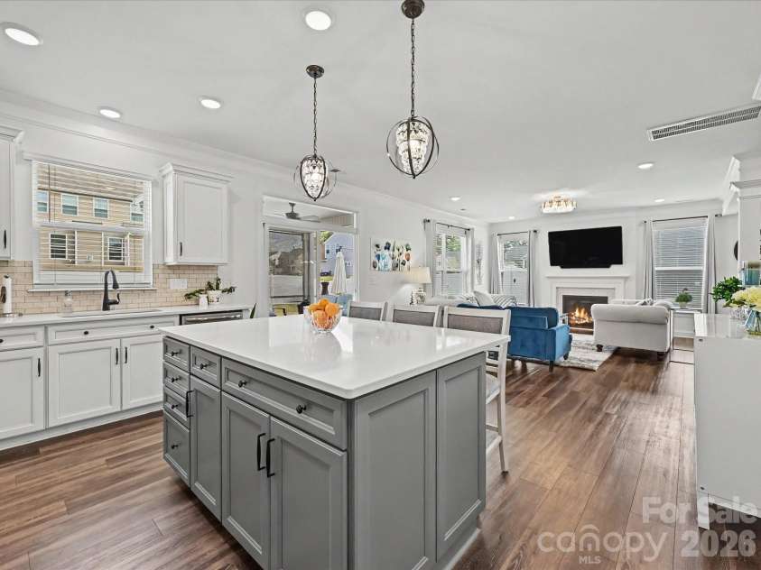 108 Old Field Road, Statesville, NC 28677.  MLS# CAR4360995, YatesRealty ID 10252. Stunning gourmet kitchen featuring a large island with seating, stainless steel appliances, subway tile backsplash, and bright open layout perfect for cooking and entertaining.