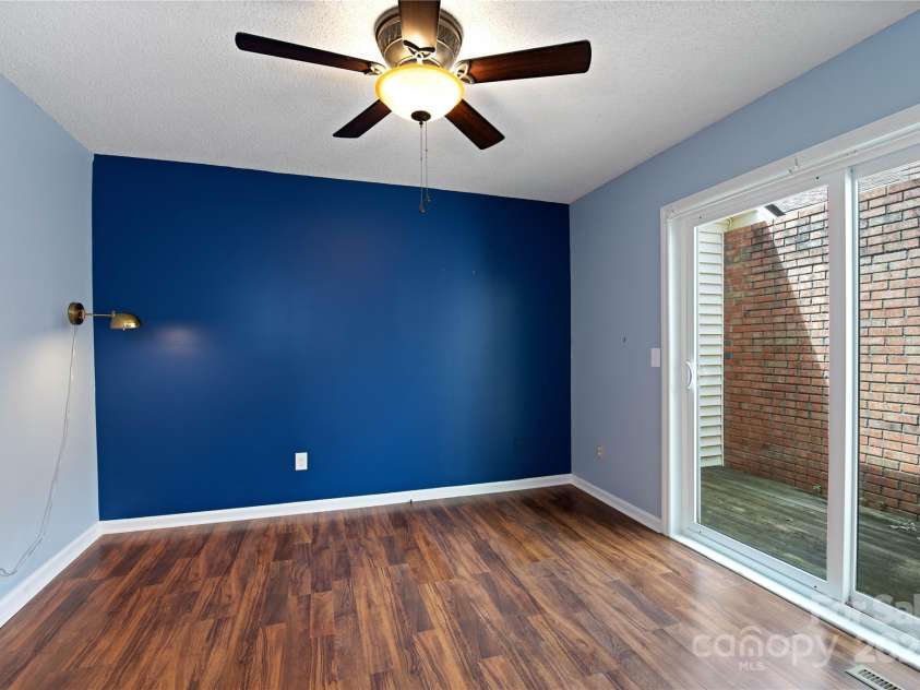 129 Exeter Court, Hendersonville, NC 28791.  MLS# CAR4299063, YatesRealty ID 10256. 3rd BR with private patio