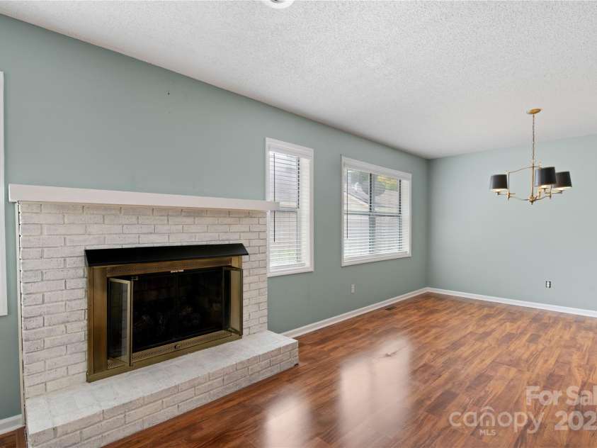 129 Exeter Court, Hendersonville, NC 28791.  MLS# CAR4299063, YatesRealty ID 10256. Fireplace