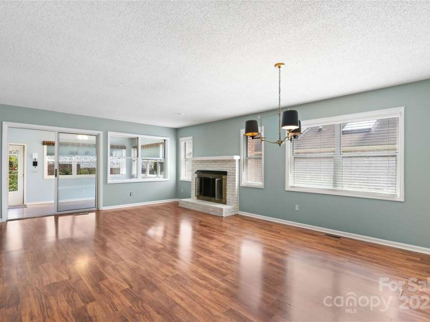 129 Exeter Court, Hendersonville, NC 28791.  MLS# CAR4299063, YatesRealty ID 10256. Open living/dining