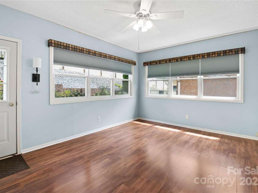 129 Exeter Court, Hendersonville, NC 28791.  MLS# CAR4299063, YatesRealty ID 10256. Sunroom!!!