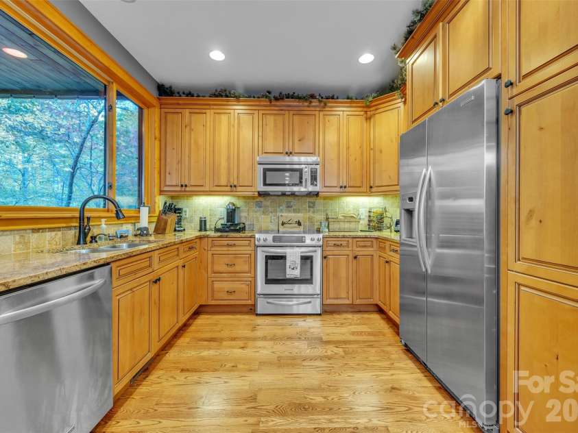89 Springhouse Drive, Elk Park, NC 28622.  MLS# CAR4310955, YatesRealty ID 10258. Kitchen 