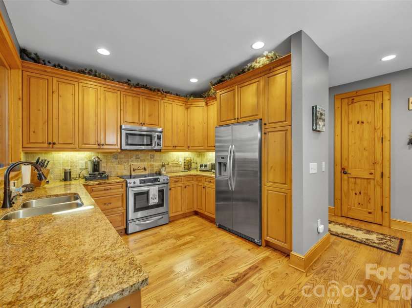 89 Springhouse Drive, Elk Park, NC 28622.  MLS# CAR4310955, YatesRealty ID 10258. Kitchen 