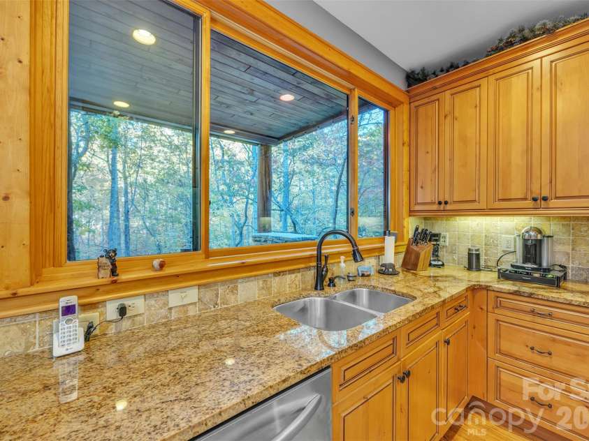 89 Springhouse Drive, Elk Park, NC 28622.  MLS# CAR4310955, YatesRealty ID 10258. Kitchen 