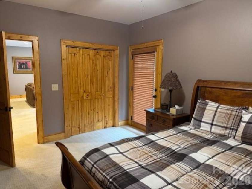 89 Springhouse Drive, Elk Park, NC 28622.  MLS# CAR4310955, YatesRealty ID 10258. Lower-level Bedroom