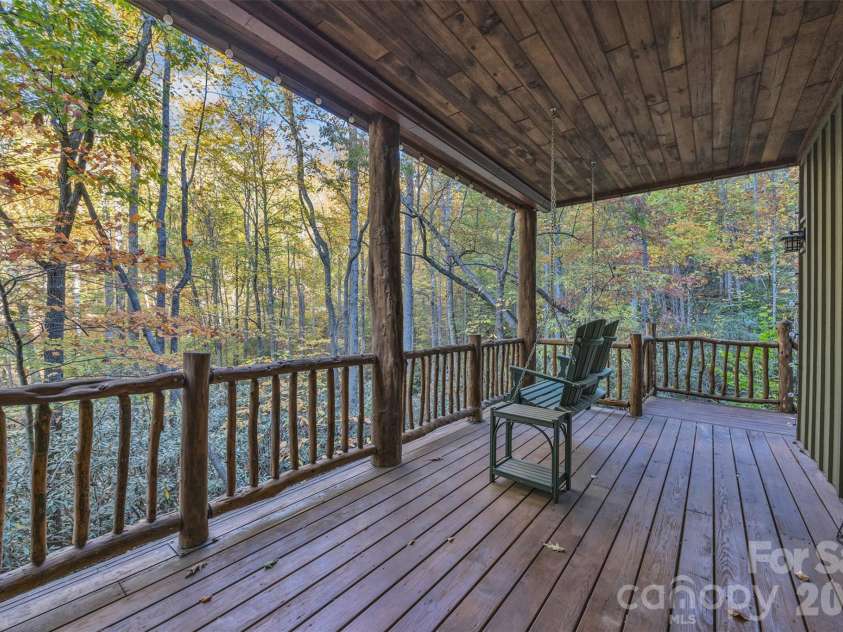 89 Springhouse Drive, Elk Park, NC 28622.  MLS# CAR4310955, YatesRealty ID 10258. Lower-level Patio 