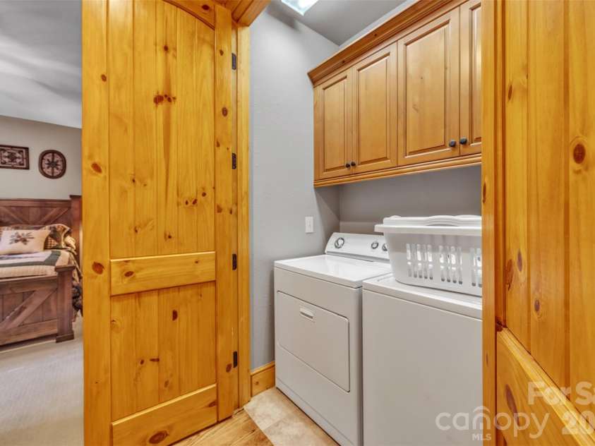 89 Springhouse Drive, Elk Park, NC 28622.  MLS# CAR4310955, YatesRealty ID 10258. Main Floor Laundry Area 