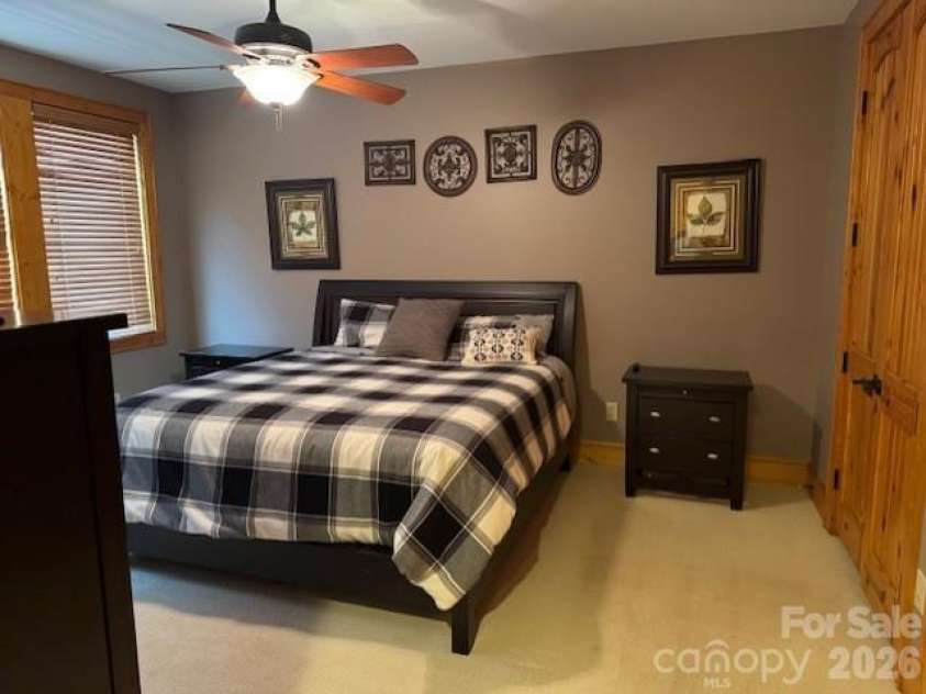 89 Springhouse Drive, Elk Park, NC 28622.  MLS# CAR4310955, YatesRealty ID 10258. Main Floor Master bedroom 