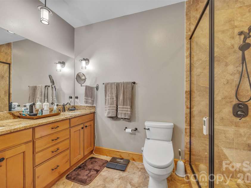 89 Springhouse Drive, Elk Park, NC 28622.  MLS# CAR4310955, YatesRealty ID 10258. Main Floor Owner's suite Bathroom