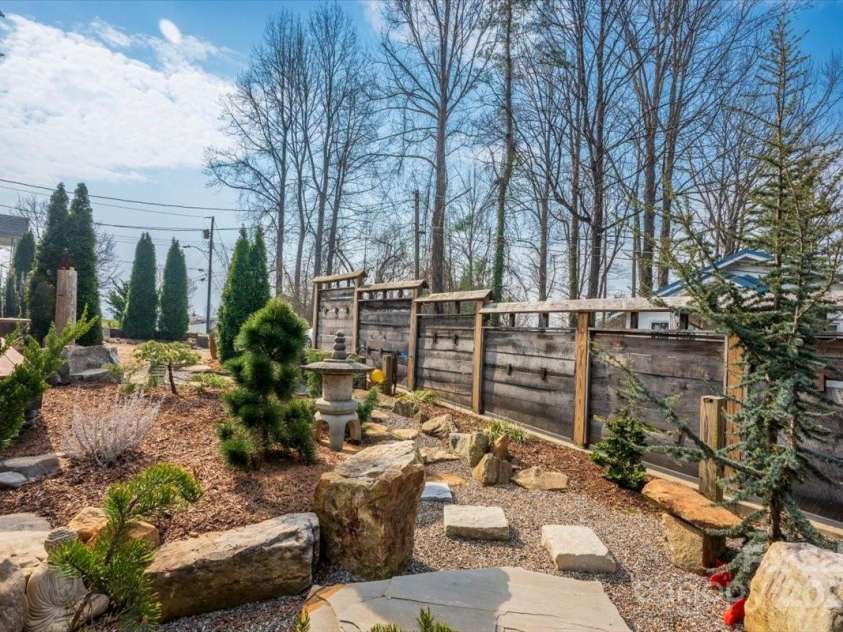 206 West Lane, Brevard, NC 28712.  MLS# CAR4226105, YatesRealty ID 10261. Custom-built privacy fence