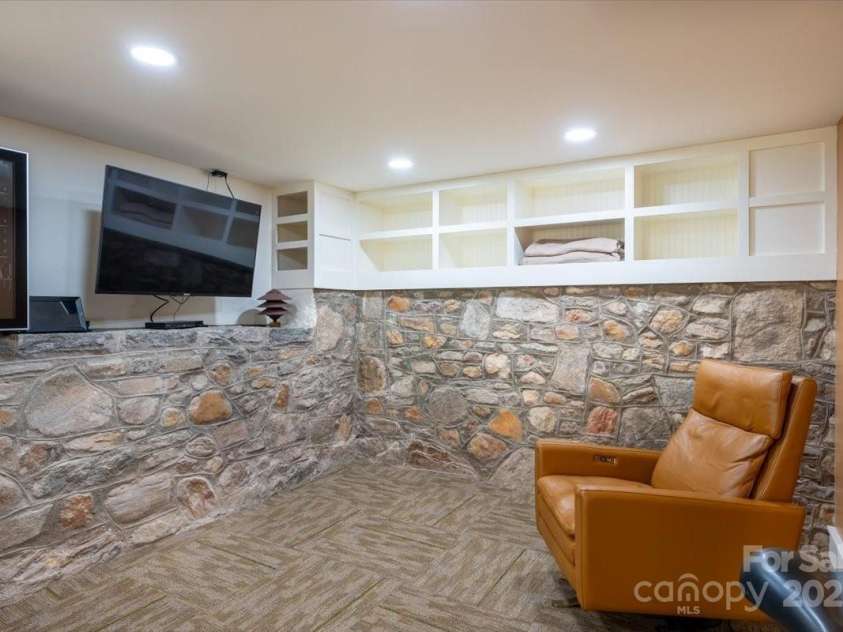 206 West Lane, Brevard, NC 28712.  MLS# CAR4226105, YatesRealty ID 10261. Entertainment room potential