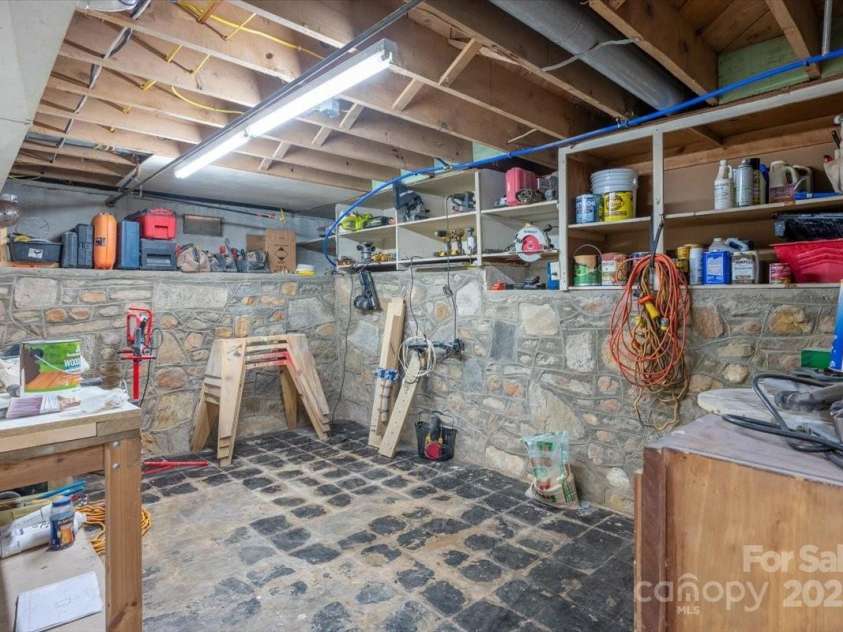 206 West Lane, Brevard, NC 28712.  MLS# CAR4226105, YatesRealty ID 10261. Storage/Workshop area