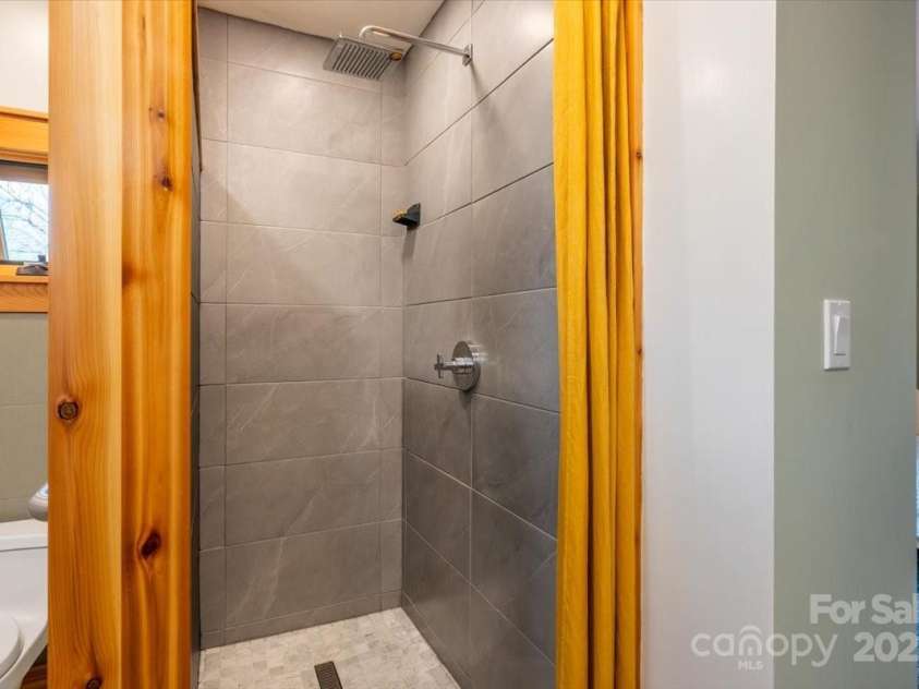 206 West Lane, Brevard, NC 28712.  MLS# CAR4226105, YatesRealty ID 10261. Walk in shower