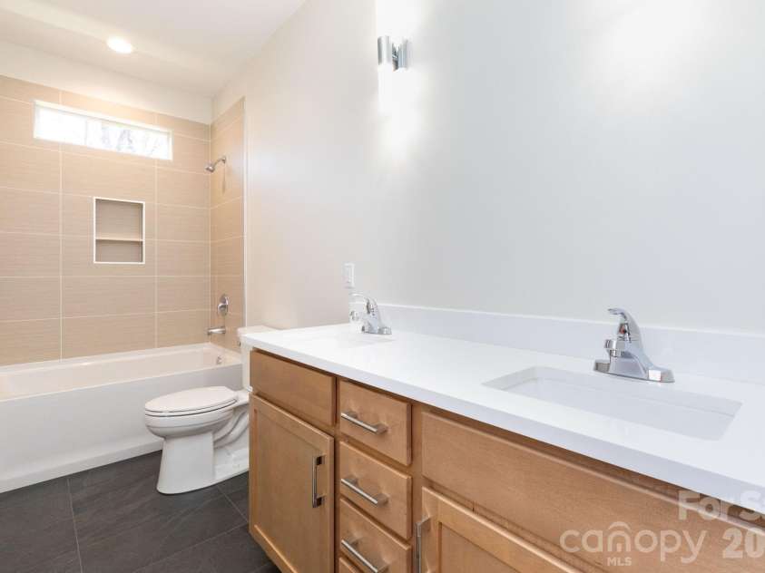 137 Arbutus Trail, Hendersonville, NC 28792.  MLS# CAR4360777, YatesRealty ID 10264. Guest Bathroom