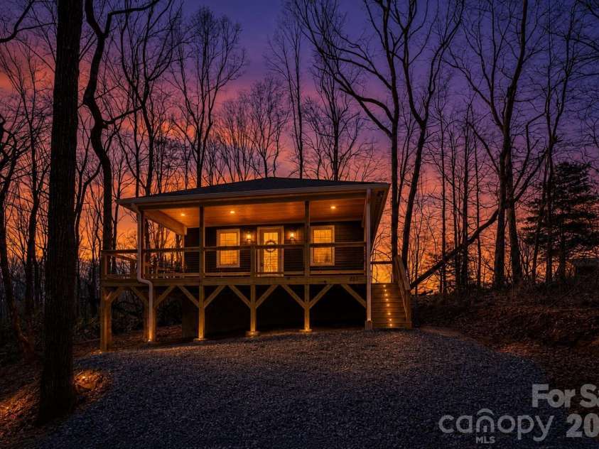 137 Arbutus Trail, Hendersonville, NC 28792.  MLS# CAR4360777, YatesRealty ID 10264. Photo Edited By AI