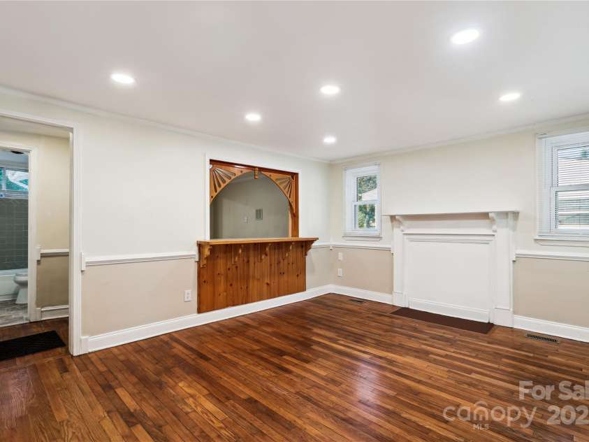 813 North Avenue, Charlotte, NC 28208.  MLS# CAR4238835, YatesRealty ID 10269. Open Living Room.