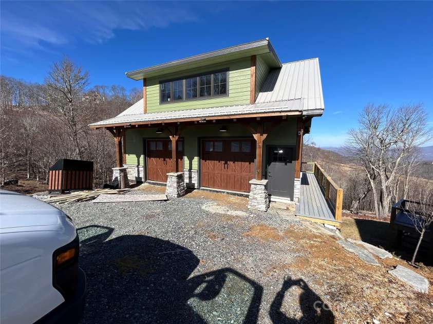 461 Sugar Hill Lane, Sugar Grove, NC 28679.  MLS# CAR4224388, YatesRealty ID 1027. Example of a garage that can be added to the lot to the left of home